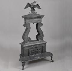 CAST IRON TWO COLUMN PARLOR STOVE WITH EAGLE FINIA - 831863