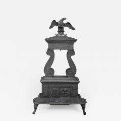 CAST IRON TWO COLUMN PARLOR STOVE WITH EAGLE FINIA - 832774