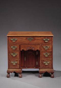 CHIPPENDALE KNEEHOLE DESK WITH BALL AND CLAW FEET AND A CARVED DRAWER - 3632061