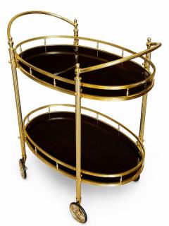 CIRCA 1960 TWO TIERED OVAL BRASS SERVING TROLLEY - 4728805
