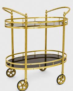 CIRCA 1960 TWO TIERED OVAL BRASS SERVING TROLLEY - 4728819
