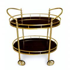 CIRCA 1960 TWO TIERED OVAL BRASS SERVING TROLLEY - 4728824