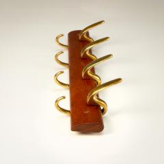 Carl Aub ck Brass and Teak Coat Hanger by Carl Aub ck for Illums Bolighus Denmark 1950s - 2948074