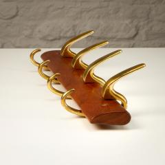 Carl Aub ck Brass and Teak Coat Hanger by Carl Aub ck for Illums Bolighus Denmark 1950s - 2948076