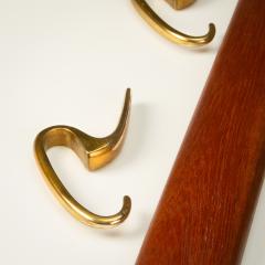 Carl Aub ck Brass and Teak Coat Hanger by Carl Aub ck for Illums Bolighus Denmark 1950s - 2948081