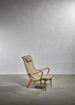 Carl Axel Acking Carl Axel Acking Lounge Chair with Aged Floral Upholstery Sweden 1940s - 1038436