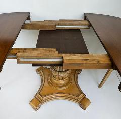 Carved Pedestal Dining Table Extends Round to Oval with Two Leaves - 4174623