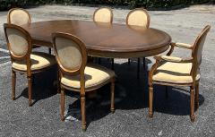 Carved Pedestal Dining Table Extends Round to Oval with Two Leaves - 4174624
