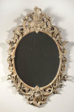 Carved and gilded and dry stripped oval mirror - 827273