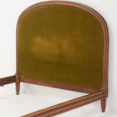 Carved walnut French bed having a shaped head and footboard C 1920  - 3400928