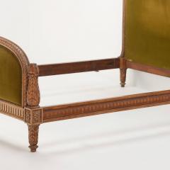 Carved walnut French bed having a shaped head and footboard C 1920  - 3400929