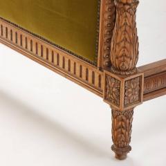 Carved walnut French bed having a shaped head and footboard C 1920  - 3400931
