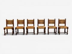 Charles Dudouyt Charles Doudouyt Six Rustic Dining Chairs Oak Rush France 1940s - 4613483