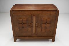 Charles Dudouyt Charles Dudouyt Oak Carved Sideboard with Brass Keys France 1940s - 3075521