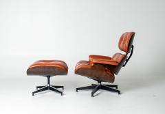 Charles Ray Eames Eames Lounge Chair Ottoman by Herman Miller 3rd Generation in Orange Leather - 4736330