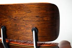 Charles Ray Eames Eames Lounge Chair Ottoman by Herman Miller 3rd Generation in Orange Leather - 4736333