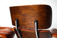 Charles Ray Eames Eames Lounge Chair Ottoman by Herman Miller 3rd Generation in Orange Leather - 4736335