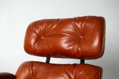 Charles Ray Eames Eames Lounge Chair Ottoman by Herman Miller 3rd Generation in Orange Leather - 4736336