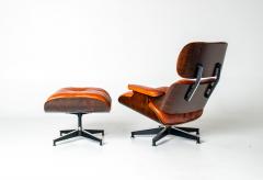 Charles Ray Eames Eames Lounge Chair Ottoman by Herman Miller 3rd Generation in Orange Leather - 4736338