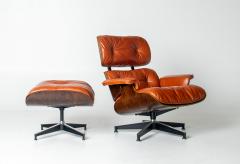 Charles Ray Eames Eames Lounge Chair Ottoman by Herman Miller 3rd Generation in Orange Leather - 4736339
