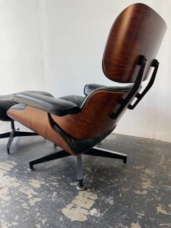 Charles Ray Eames Eames Lounge Chair and Ottoman in Rosewood and Black Leather 3rd Generation - 3831397