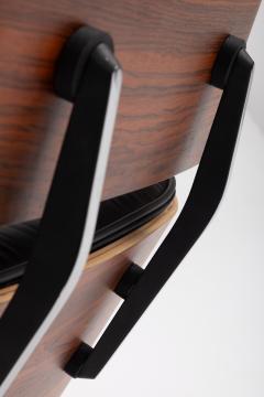 Charles Ray Eames Eames Lounge Chair and Ottoman in Rosewood and Black Leather Herman Miller - 4526324