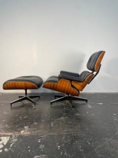 Charles Ray Eames New Tall Eames Lounge Chair in Palisander and Black Leather - 4058824