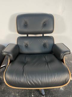 Charles Ray Eames New Tall Eames Lounge Chair in Palisander and Black Leather - 4058832