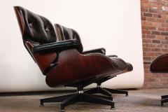 Charles Ray Eames Pair of Vintage Rosewood Eames 670 Lounge Chairs with Ottoman - 421550