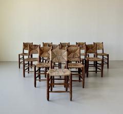 Charlotte Perriand Charlotte Perriand set of twelve Bauche chairs model no 19 1950s - 4177213