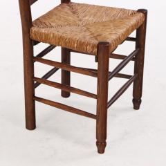 Charlotte Perriand Eight French oak rush dining chairs in manner of Charlotte Perriand C 1950  - 4234259