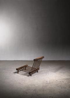 Charlotte Perriand - Low 'chauffeuse' (fireside) lounge chair in elm for  Les Arcs
