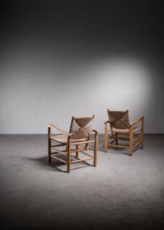 Charlotte Perriand - Pair Charlotte Perriand 'model no. 21' lounge chairs