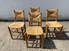 Charlotte Perriand Set of Four Bauche Chairs by Charlotte Perriand Steph Simon Editions - 2542350