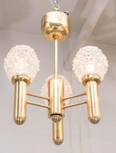 Chic Mid Century Modernist Three Arm Brass Chandelier with Faceted Globes - 1461239