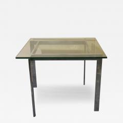 Chrome and glass side table in the manner of Milo Baughman - 3393767