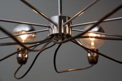 Chromed Steel Eight Arm Chandelier in the Style of Gino Sarfatti 1960s - 4510489
