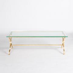 Coffee table framed with ring motif legs and a single stretcher - 1790224