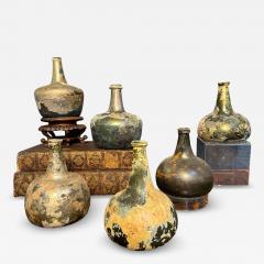 Collection of 17th and 18th century iridescent wine bottles - 4817476