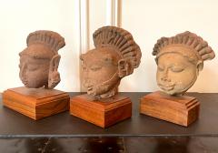 Collection of Three Indian Sandstone Carved Heads of Deities - 2338193