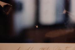 Color Photograph Detail Of A Photograph With Script - 3174094