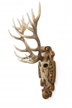 Continental Rustic Wall Plaque Featuring an Elk Skull with a Painted Insignia - 4658782