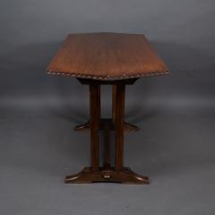 Cotswold style oak refectory dining or library table with carved chevron details - 4192942