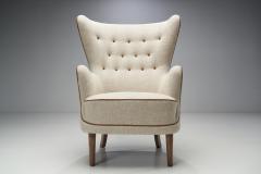 Danish Cabinetmaker Wing Back Chair with Stained Beech Legs Denmark ca 1950s - 2245686