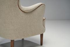 Danish Cabinetmaker Wing Back Chair with Stained Beech Legs Denmark ca 1950s - 2245691