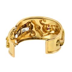 David Webb DAVID WEBB PLATINUM 18K YELLOW GOLD REPOUSSE MONKEY RUBY EYES CUFF BRACELET - 3492980