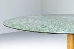 Dining Table in Round dark Imperial Marble and casted Brass Base Italy 1970s - 3188423