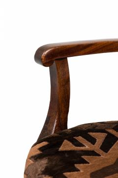 Directoire Walnut and Brown and Black Geometric Upholstered Sabre Leg Armchair - 4169838