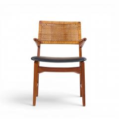 E Knudsen for Jensen Lykkegaard Model 48 Danish Teak Cane Dining Arm Chair - 4637990