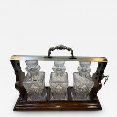 ELEGANT VICTORIAN THREE DECANTER TANTALUS - 2487281